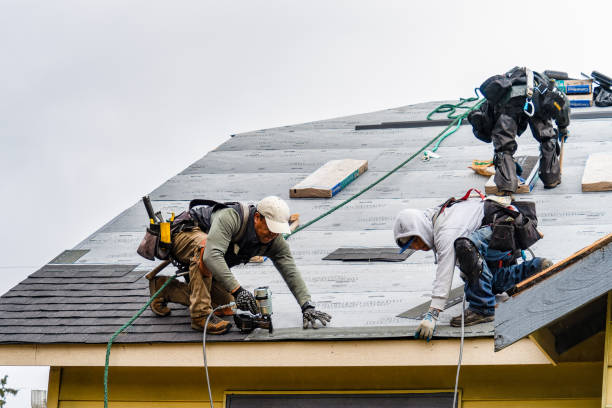 Professional Roofing technician working in Huntington, MA